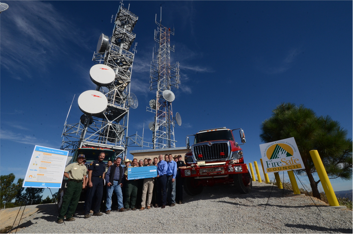 PG&E meteorologist John Lindsey took this photo on top of the Cuesta Ridge of, from left to right, Robert Lewin in blue, Dan Turner in the blue vest, Frank Mecham in the ball cap and PG&E employees Pat Mullen and Justin Kephart.