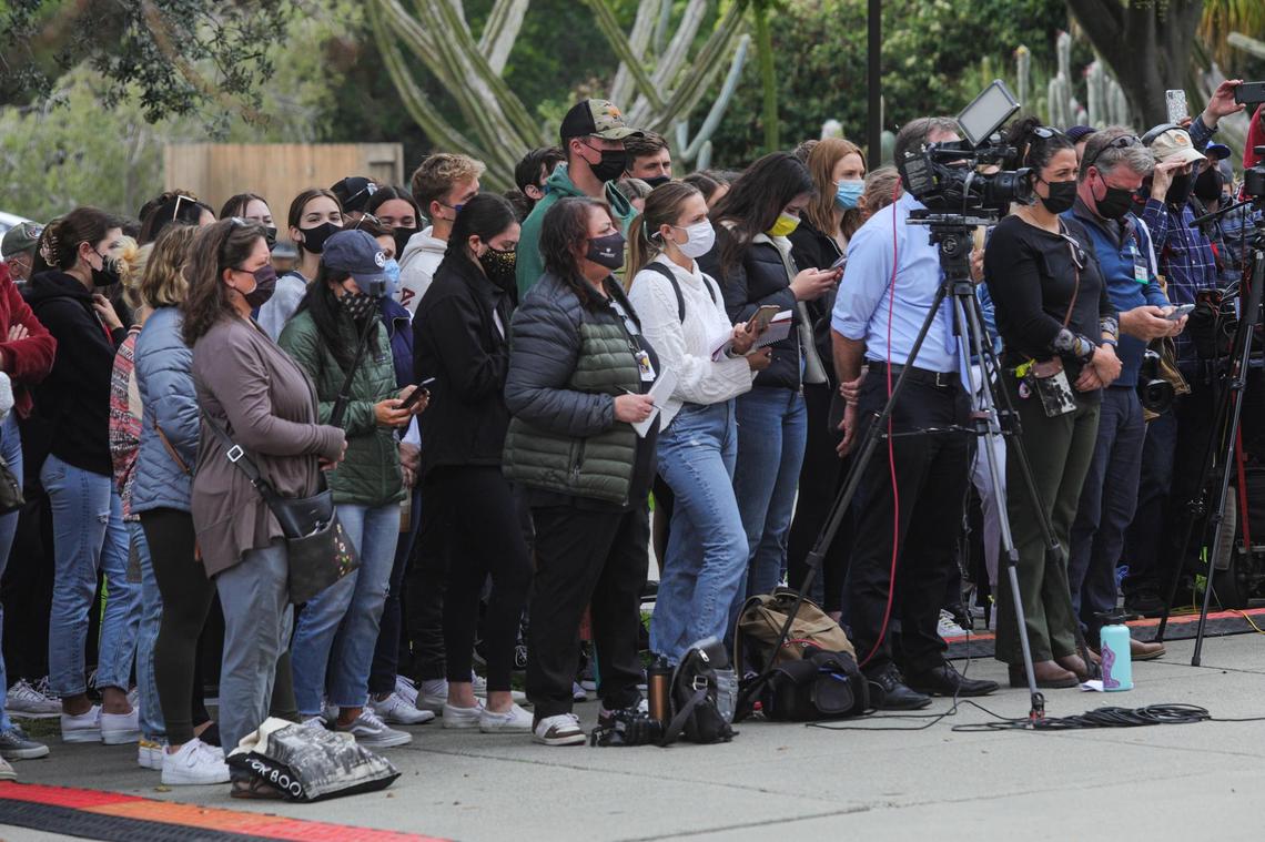 Members of the media listen and others listen during a news conference Tuesday, April 13, 2021, at Cal Poly announcing the arrest of Paul Flores and Reuben Flores in connection with the disappearance of Kristin Smart.