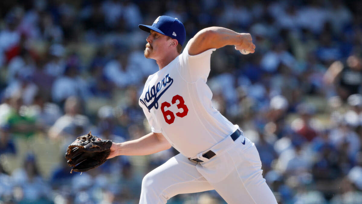 Los Angeles Dodgers relief pitcher Justin Bruihl throws to a Los Angeles Angels batter during the eighth inning of a baseball game in Los Angeles, Sunday, Aug. 8, 2021. The former Cal Poly lefthander pitched 1-2/3 scoreless innings in his Major League debut.