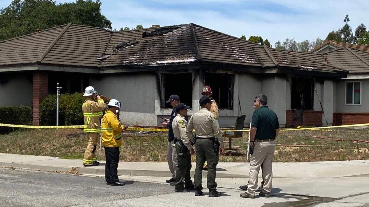 Firefighters and sheriff’s deputies on scene of a suspected arson fire at a residence on the 1400 block of Genoa Way in Orcutt.