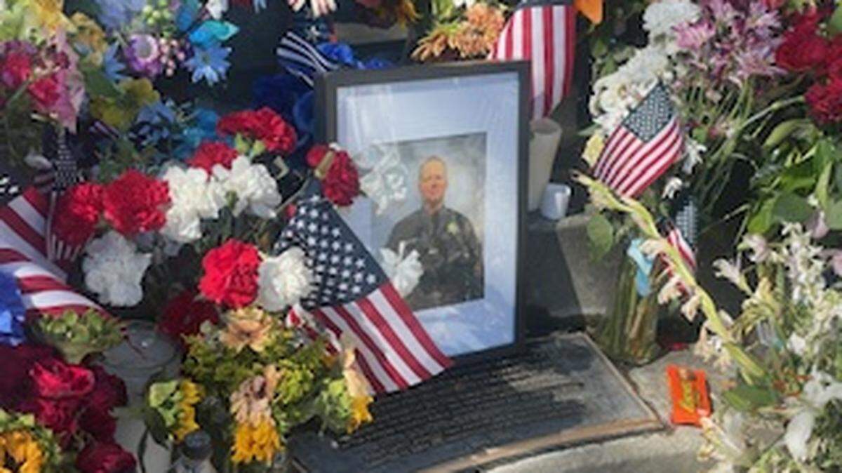 A memorial honors Officer Matthew Bowen, 32, who died after being hit by a suspected DUI driver in Vacaville on July 11, 2024. He was the first Vacaville police officer to be killed in the line of duty.