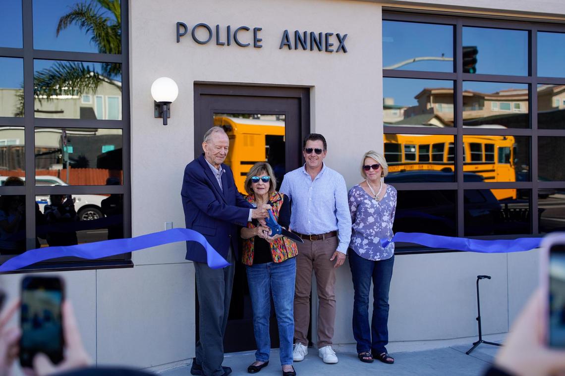 Pismo Beach Mayor Ed Waage and City Council members Mary Ann Reiss, Scott Newton and Marcia Guthrie cut the ribbon at the grand opening of the new Pismo Beach Police & Parking Annex on Monday, Oct. 14, 2024. The $1.5 million facility was home to Pismo Beach City Hall and a tourism office over its nine decades of history.
