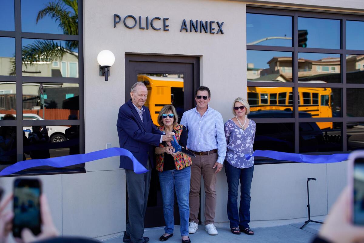 Pismo Beach Mayor Ed Waage and City Council members Mary Ann Reiss, Scott Newton and Marcia Guthrie cut the ribbon at the grand opening of the new Pismo Beach Police & Parking Annex on Monday, Oct. 14, 2024. The $1.5 million facility was home to Pismo Beach City Hall and a tourism office over its nine decades of history.