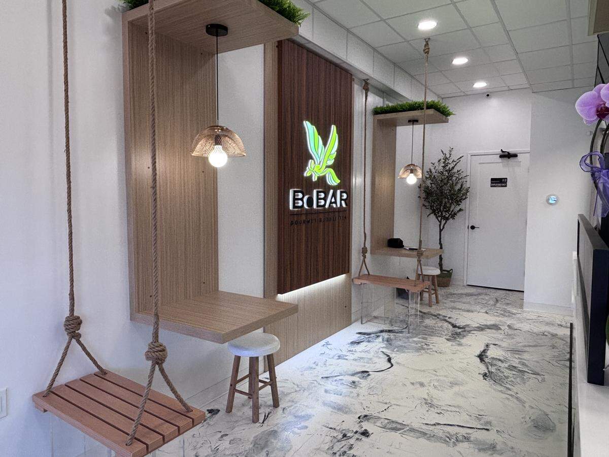 Bobar Gourmet Bubble Tea opened on March 16, 2026, with wooden decor, tables and seating, with chairs that look like swing sets.