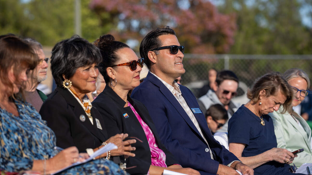 San Luis Obispo County District 3 Supervisor Dawn Ortiz-Legg, San Luis Obispo Mayor Erica Stewart and District 4 Supervisor Jimmy Paulding sit in the audience during the grand opening of the Welcome Home Village project on Monday, June 8, 2026. The project consists of 40 3D-printed permanent supportive housing units and 14 interim supportive housing units with wraparound supportive services onsite.