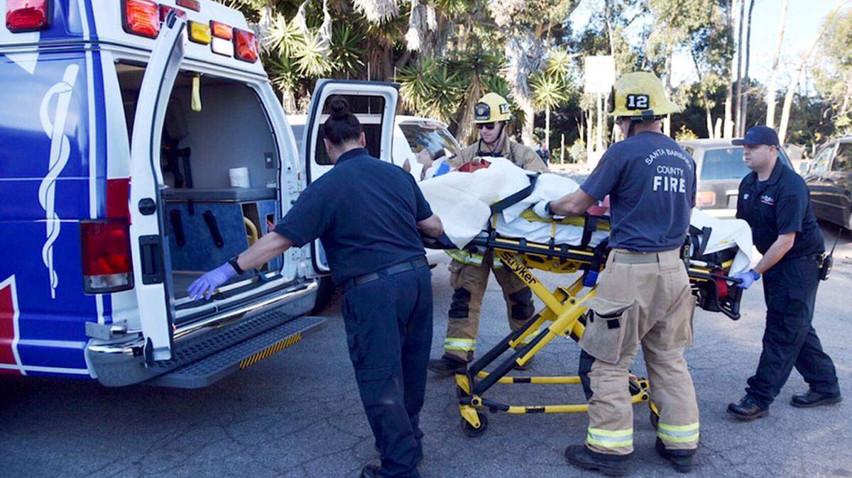 A man who was struck by an Amtrak train and seriously injured over the weekend in Old Town Goleta is loaded into an ambulance for transport to Santa Barbara Cottage Hospital.