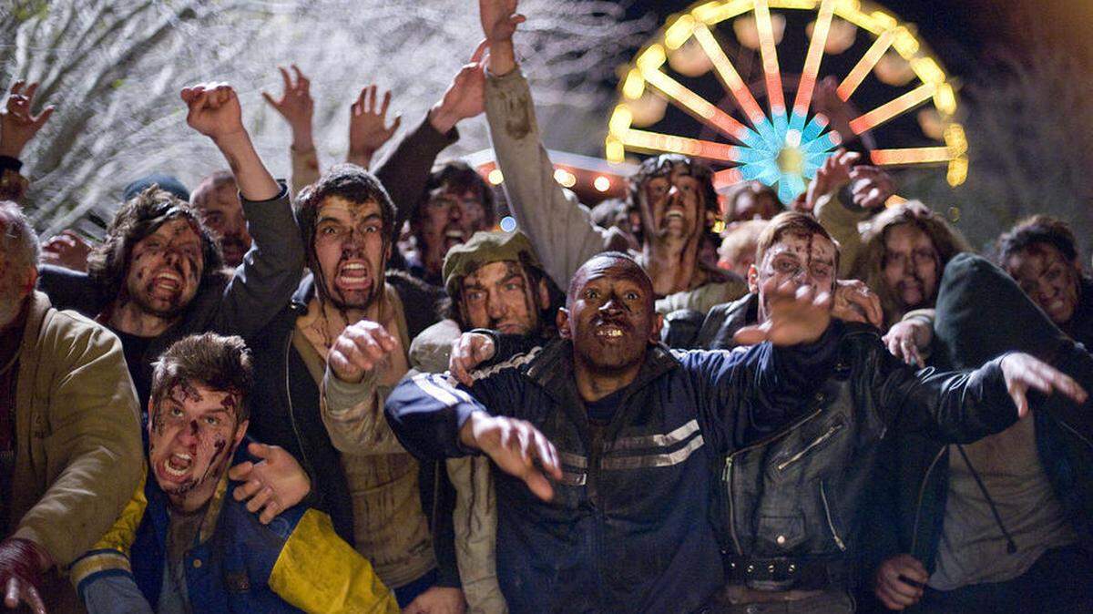 Zombies gather at an amusement park in "Zombieland."