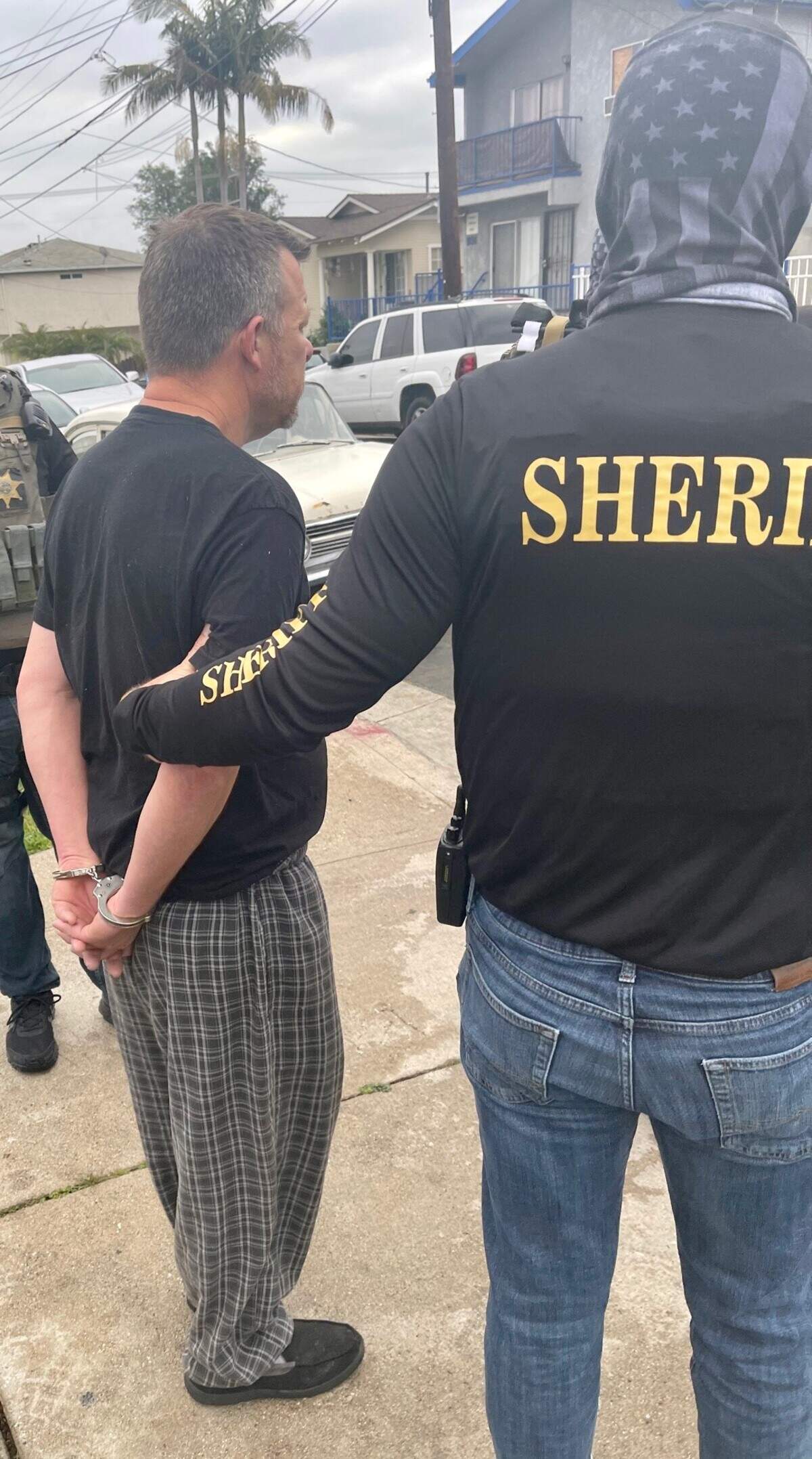 Paul Flores, 44, of San Pedro is arrested Tuesday, April 13, 2021, on suspicion of murder in connection to the disappearance of missing Cal Poly student Kristin Smart.