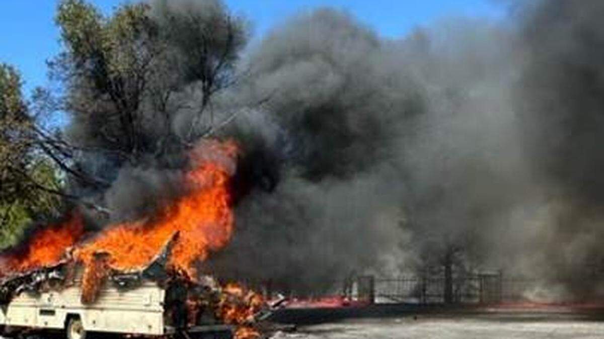 A motor home caught fire in the Home Depot parking lot in Atascadero on Sunday afternoon Aug. 11, 2024, spreading flames a quarter of a mile into surrounding vegetation and requiring backup to put out the flames.