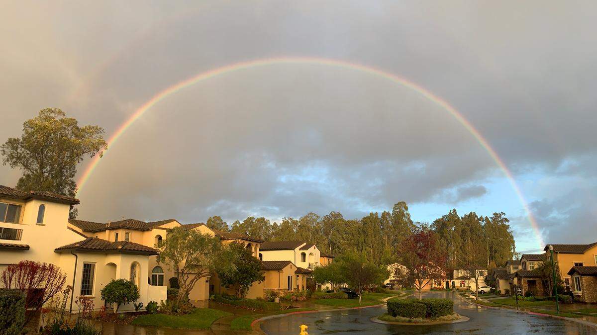 A double rainbow arches over Monarch Dunes in Nipomo on Jan. 30, 2021. 