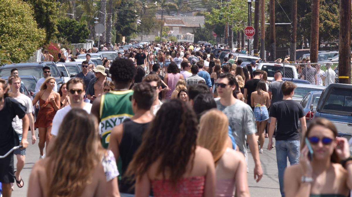 In past years, young people have swarmed the streets of Isla Vista for the annual Deltopia spring street party. Efforts underway to keep the once-rowdy, unsanctioned event a local affair, especially during the COVID-19 pandemic.