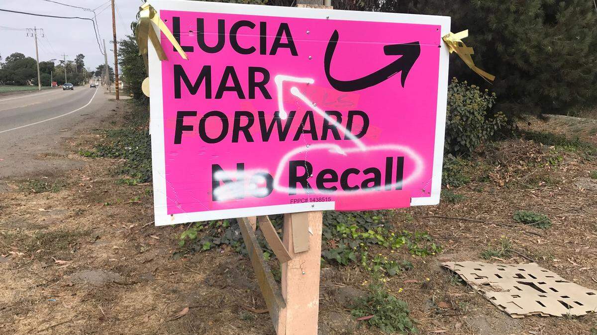 This sign in Arroyo Grande is one of several “no recall” placards that have been defaced. Backers of the recall are trying to remove three members of the Lucia Mar Unified School District.