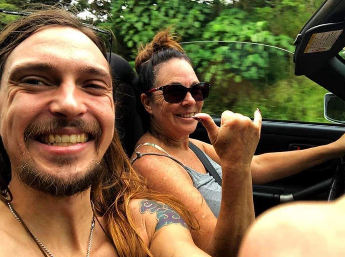 Todd Pinion, left, and his mother, Melody, drive in Hawaii while on vacation. Todd Pinion was killed in an alleged hate crime in San Luis Obispo County on Oct. 23, 2024.