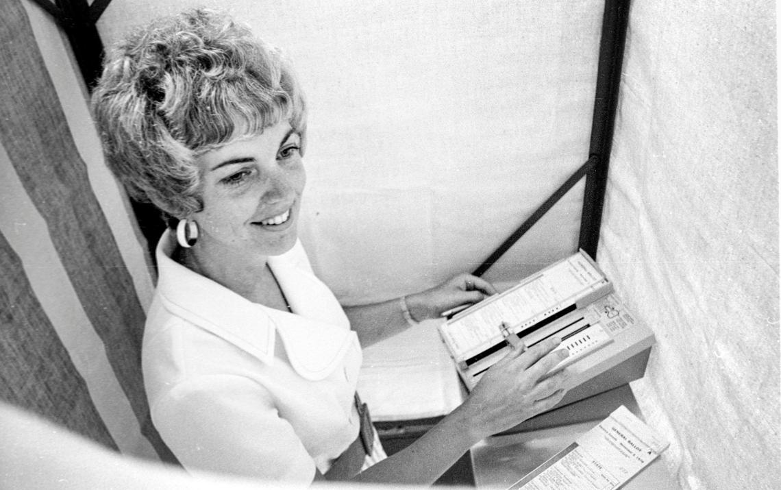 Diane Maddux, a deputy San Luis Obispo County clerk, demonstrates new punch card voting machine on Aug. 27, 1975. The Diamond International system replaced old Shoup Voting Machines that came into service in 1957.