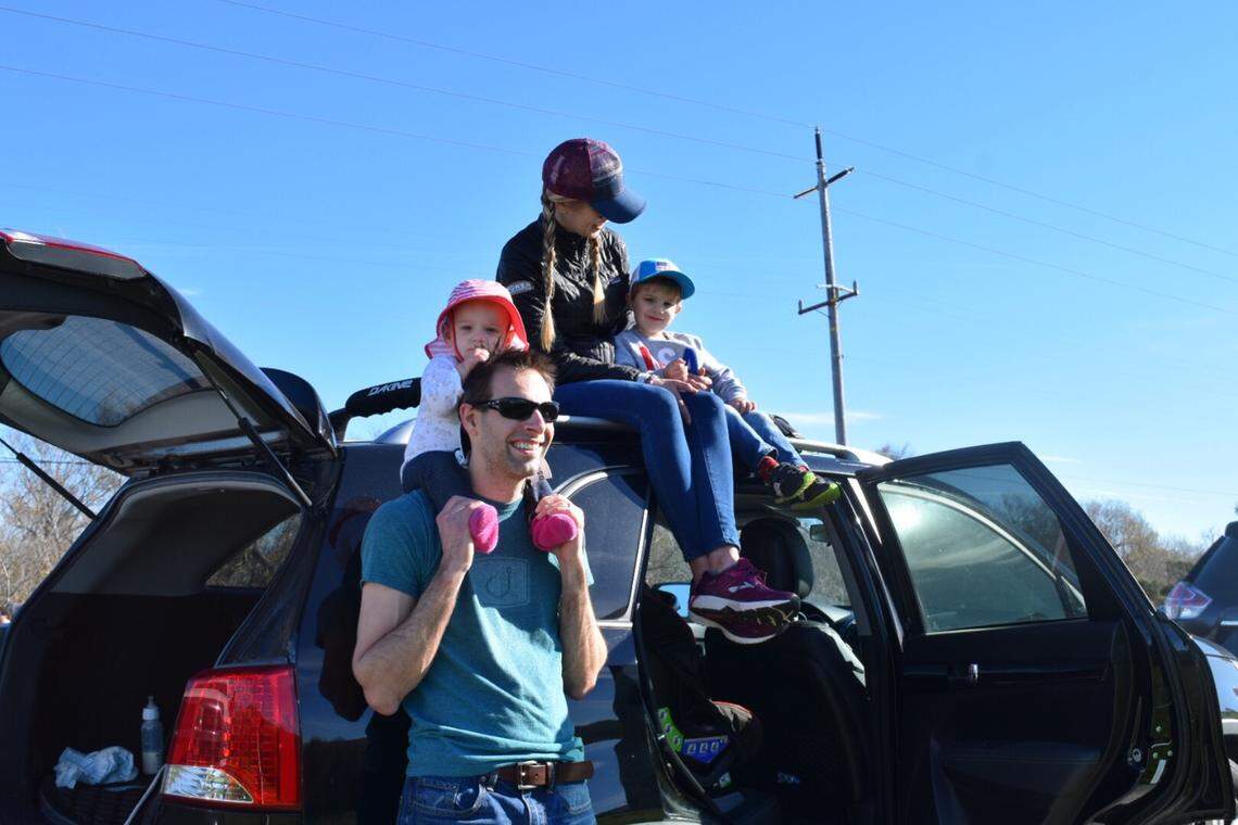 David and Brittany Breaux, with their children Alana and Nathan, get ready for the Delta IV heavy rocket launch from Vandenberg Air Force Base on Saturday morning.
