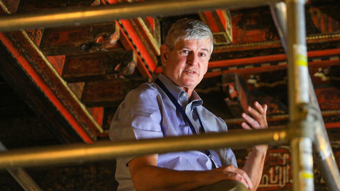 Gary Hulbert has seen every inch of this Spanish-Moorish ceiling in the Hearst Castle Morning room from the top of this scaffold.