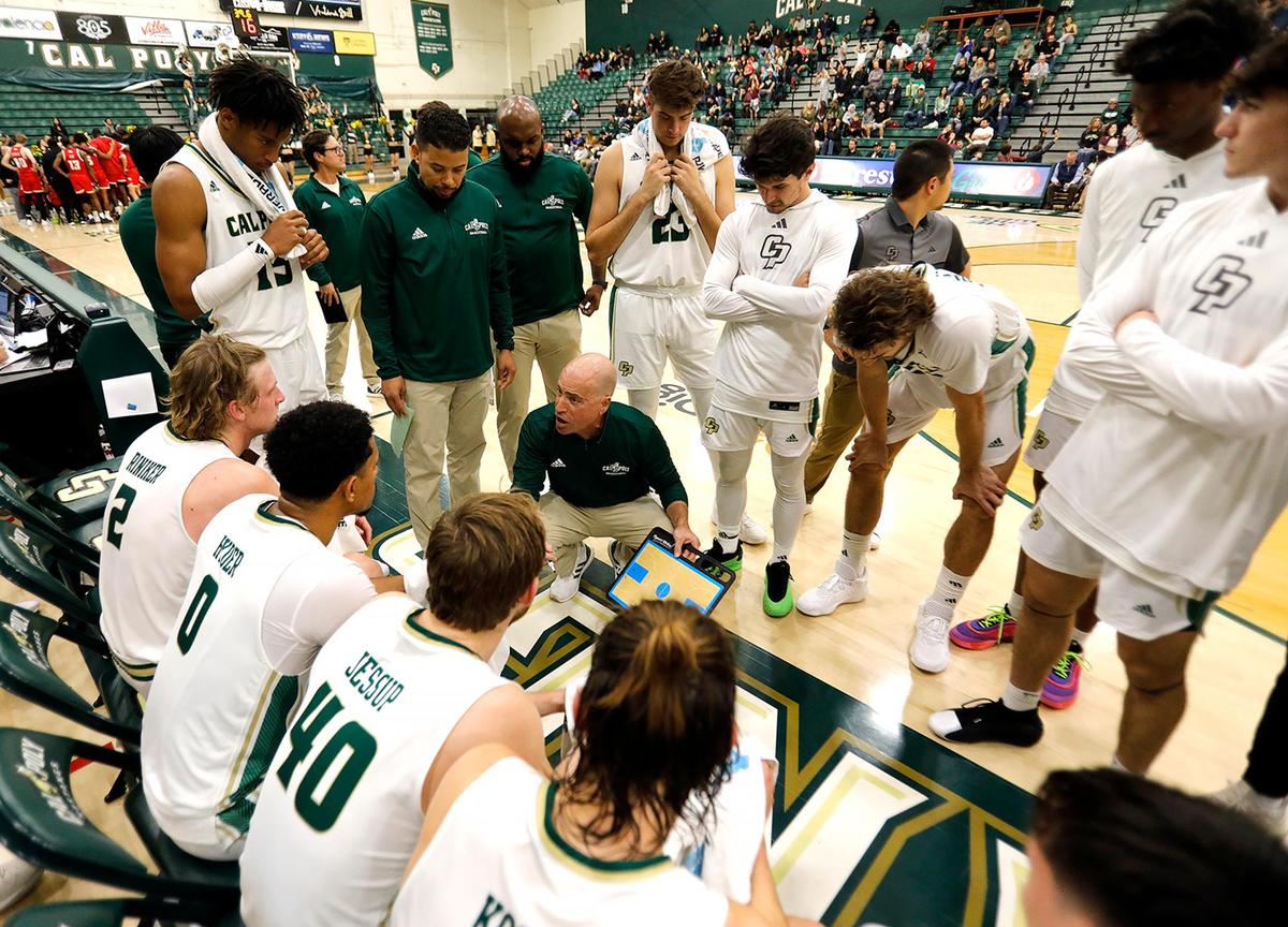 Cal Poly basketball head coach Mike DeGeorge calls time-out with seconds left in overtime. Cal Poly Mustangs beat the Denver Pioneers 95-94 in overtime at Mott Athletic Center at Cal Poly’s San Luis Obispo campus, Tuesday, Dec. 17, 2024.