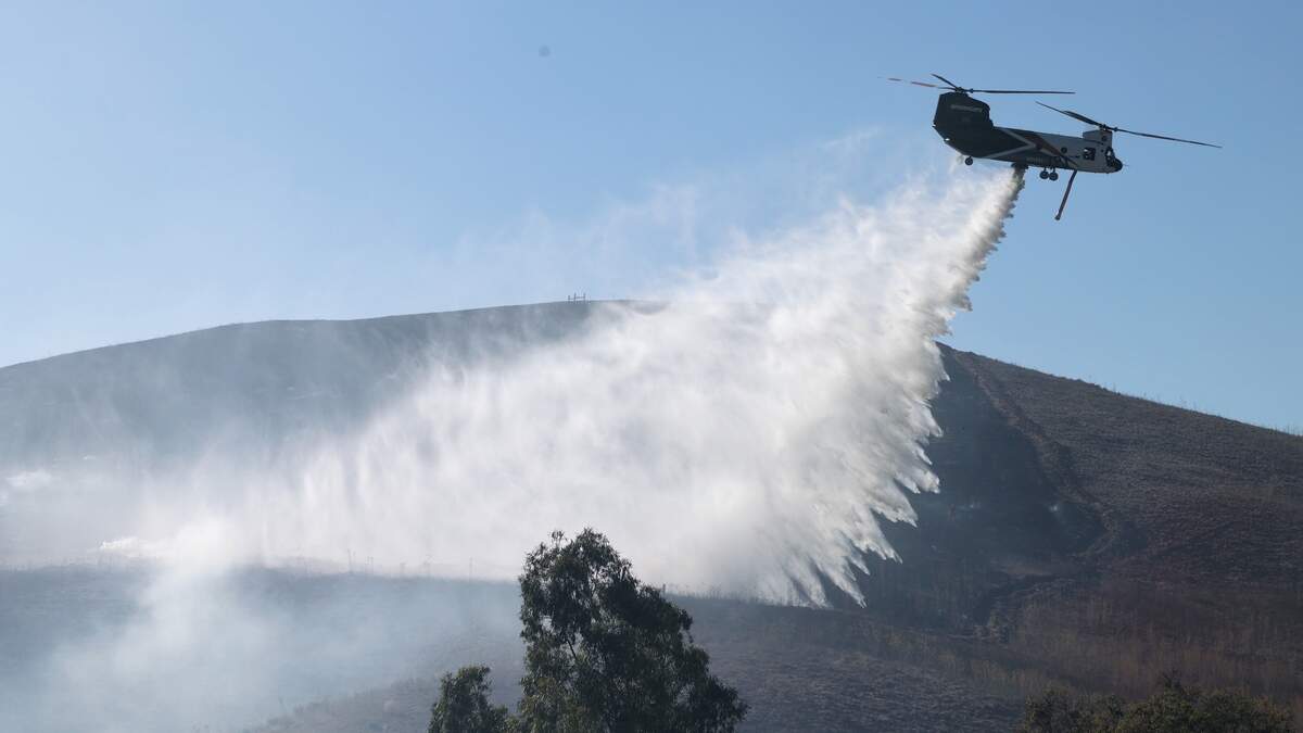 Fire threatens structures near SLO; drug bust nets arrests. Today's top stories