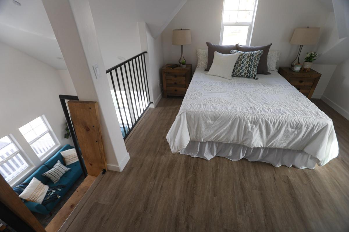 The smallest home at the new Grand Oaks Paseo development in Atascadero is 703 square feet, with a bedroom on the first floor and a loft above.