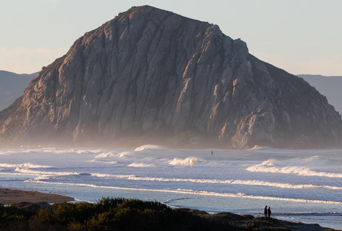 Waves crash near Morro Rock.