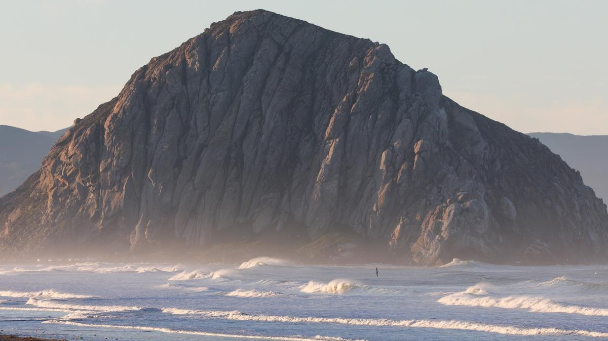 Waves crash near Morro Rock.