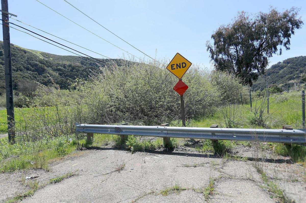 Funding, property disputes, and redesign hurdles facing the Bob Jones Trail extension. This is a view of Clover Ridge Lane south of Venado Trail.