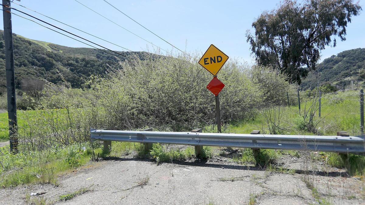 Funding, property disputes and redesign hurdles have plagued the Bob Jones Trail extension. This is a view of Clover Ridge Lane south of Venado Trail.
