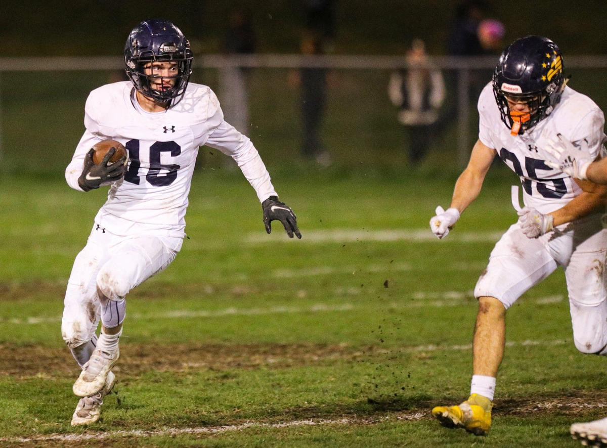 Koa Kopcho runs for the Eagles. Mission Prep beat Arroyo Grande 35-14 in second-round CIF Central Section football playoff game on Nov. 10, 2022.