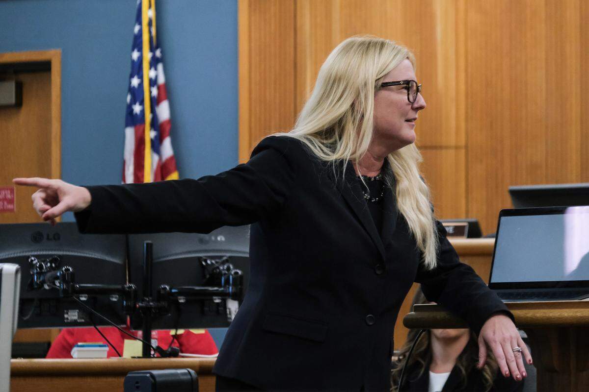 San Luis Obispo County Deputy District Attorney Kimbery Dittrich points to Nate Abate as she gives closing arguments in the case against him in San Luis Obispo Superior Court on Oct. 16, 2024. Abate is charged with two counts of rape by force, one count of rape by intoxication and oral copulation of a minor — all felonies.
