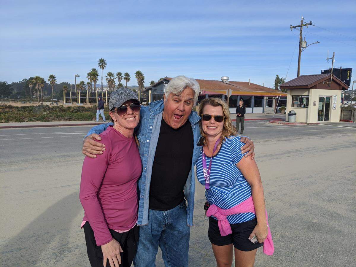 Jay Leno, center, poses for a picture with Christy Olmstead, left, and Holly Leighton near Fin’s Seafood Bar & Grill in Grover Beach on Dec. 20, 2019.