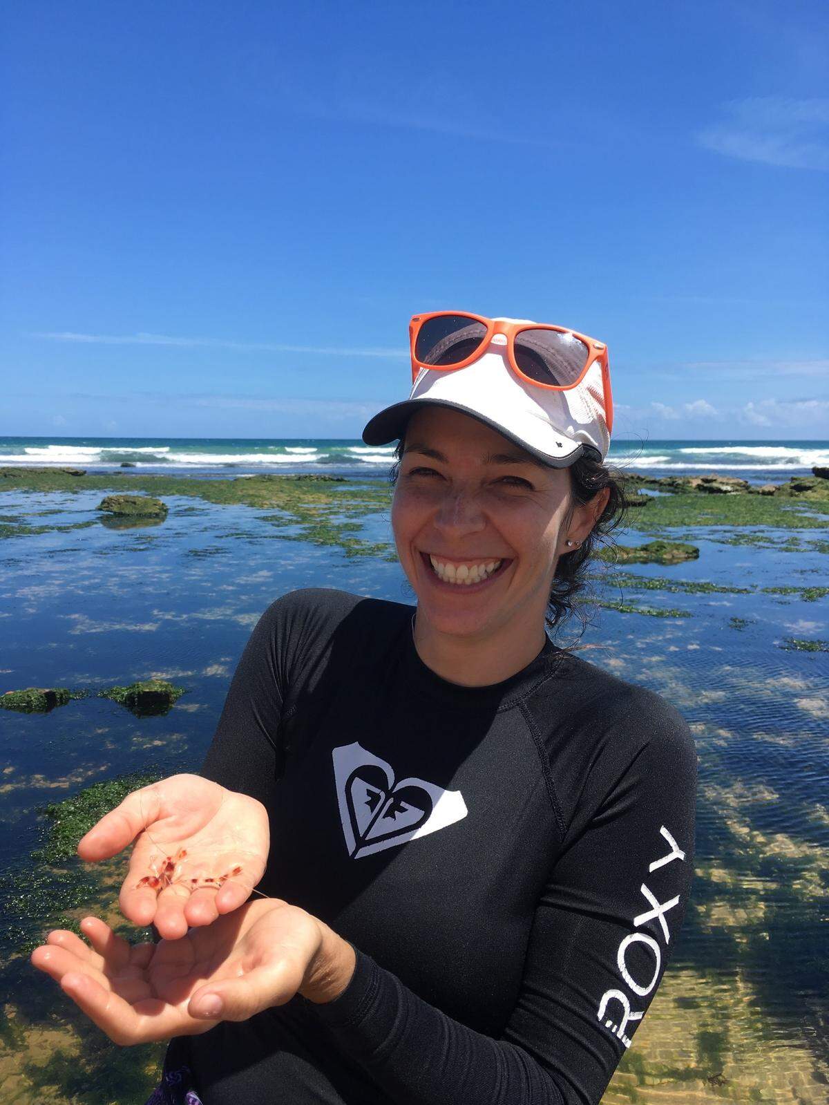 Ocean and earth scientist Joana Tavares doing fieldwork in the tide pools of Bahia, Brazil.