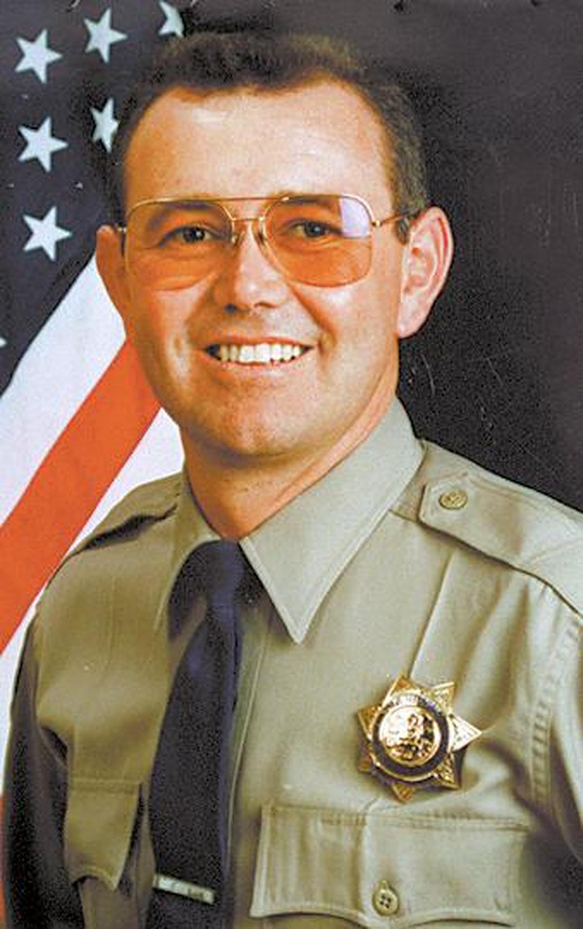 Rick Stovall was responding to a late night call of a truck accident on Highway 166 with his partner. The flood swollen Cuyama River had washed out the roadway leading to the death of both officers Feb. 24, 1998.