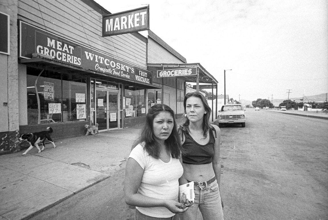Yolanda Flores, left, and Sheila DeLespiresse cross San Miguel Street on Sept. 17, 1980, in front of Witcosky’s Market where Flores’ daughter was last seen alive. Teresa Lynn “Terry” Flores, 5, and Martha Jo Ann “Marty” Mezo, 4, disappeared shortly after 11 a.m. on May 17, 1980. The double murder is still unsolved.