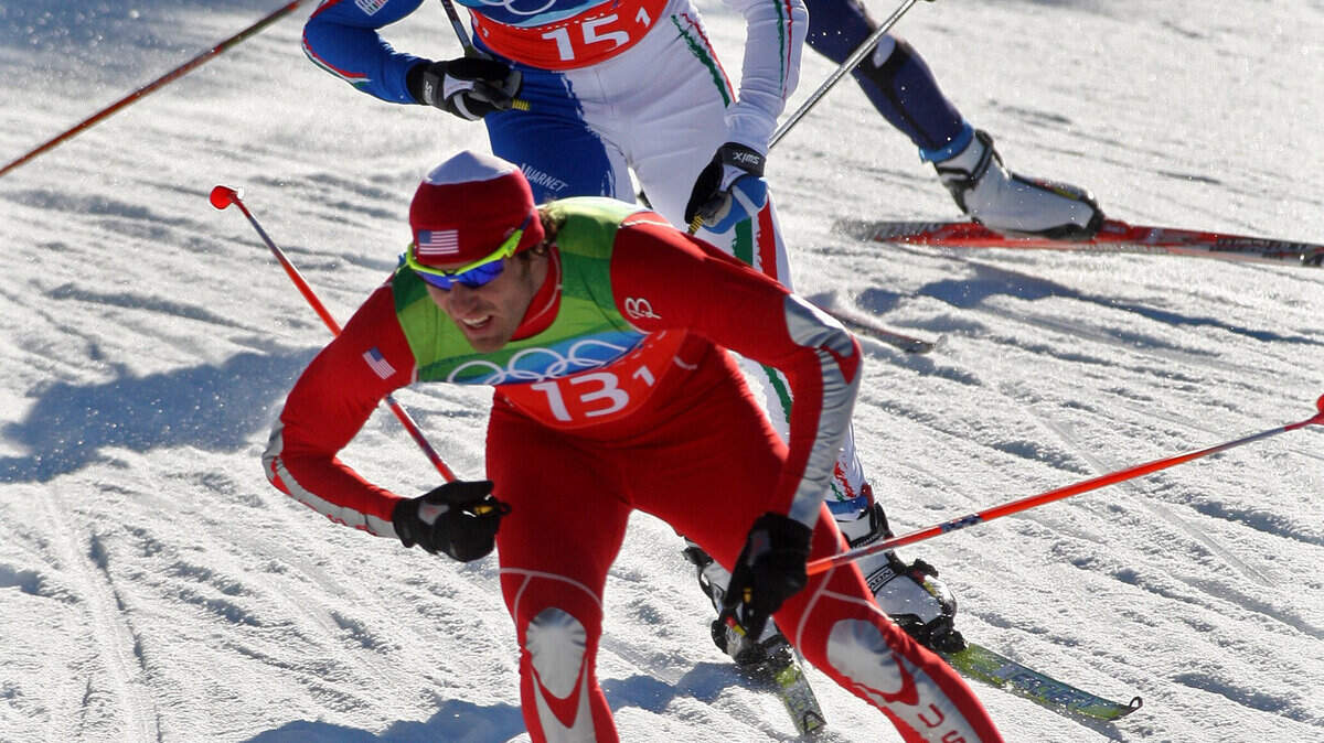 America's Torin Koos leads a group of cross-country skiers during the semifinal race of the men's team sprint. (Steve Ringman / Seattle Times / MCT)