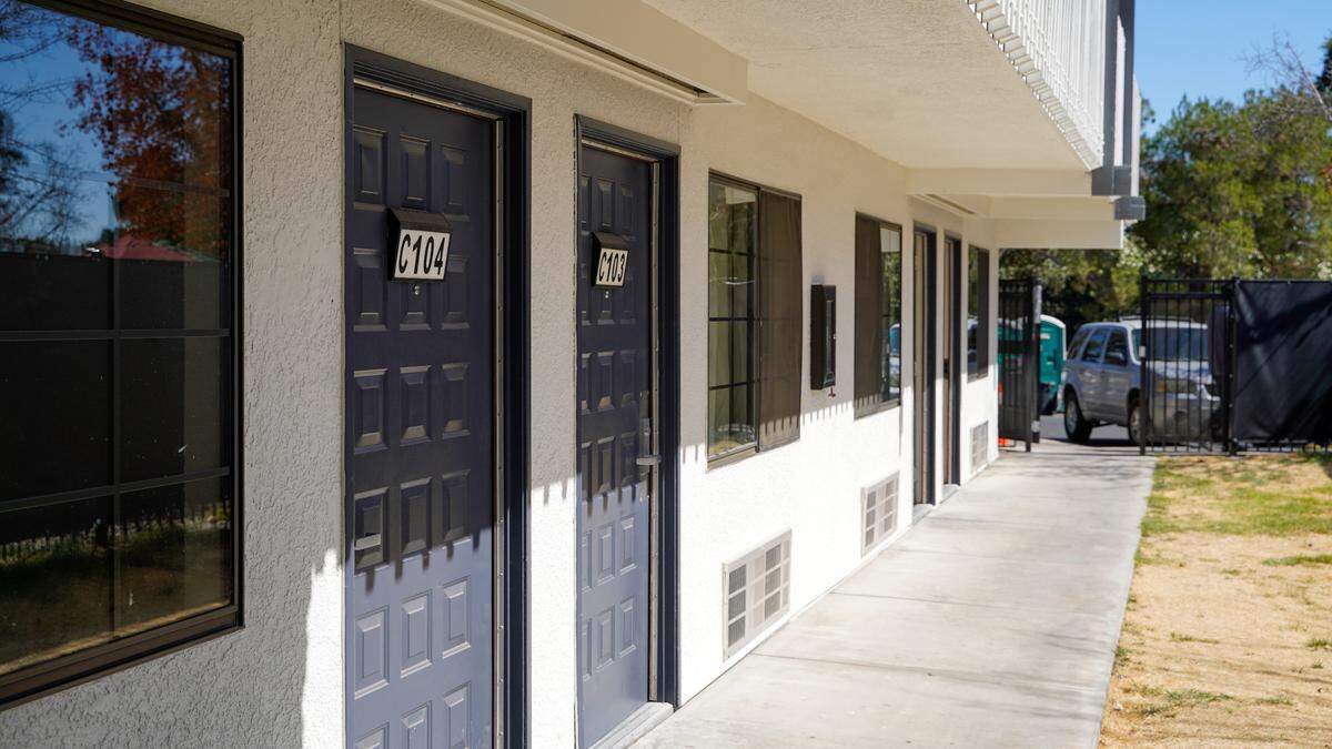 The Housing Authority of San Luis Obispo County, El Camino Homeless Organization and People’s Self-Help Housing hosted the grand opening of the Paso Homekey housing complex Oct. 3, 2023. The project offers 28 rooms of emergency shelter space (marked by red doors) and 60 permanent supportive units of affordable housing (marked by blue doors).
