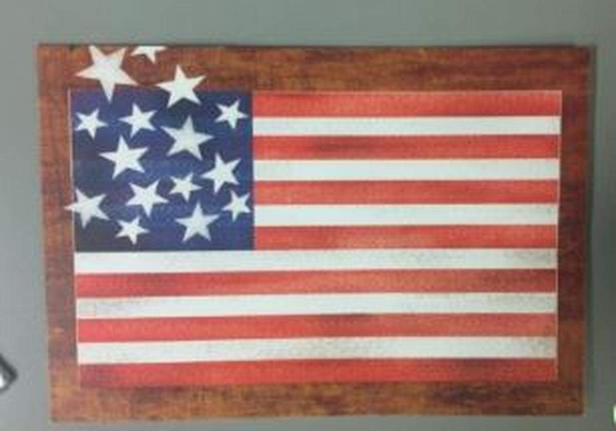 A picture of a Hallmark card with an American flag on it, which San Luis Obispo police said is the type of card Richard Vincent Orcutt, 62, allegedly used to send threatening letters to property owners and property management companies in his neighborhood.