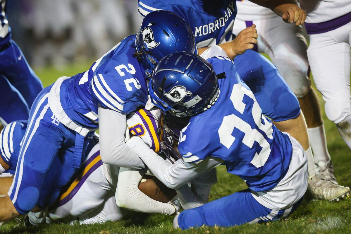Nehemiah White is tackled by Aiden Blackwood and Shawn Shaffer. The score at half time was Morro Bay 28 Fresno 7 but a lightning storm ended the contest at that point.