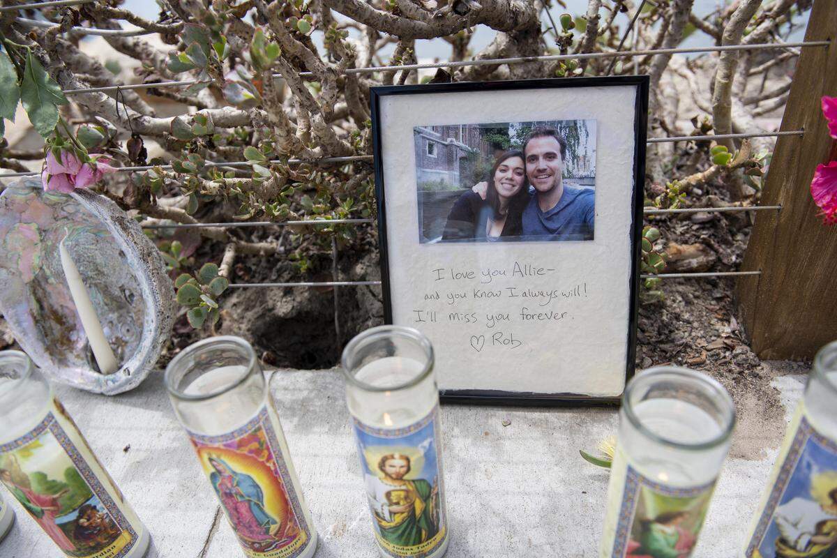 A photo left at a memorial for the victims of the Conception vessel reads “I love you Allie - and you know I always Will! I’ll miss you forever. Rob,” placed at the Sea Landing at Santa Barbara Harbor in Santa Barbara, Calif., Tuesday, Sept. 3, 2019. Officials say no one likely escaped the flames that tore through a boat packed with scuba divers and the search for survivors has been called off. (AP Photo/Christian Monterrosa)