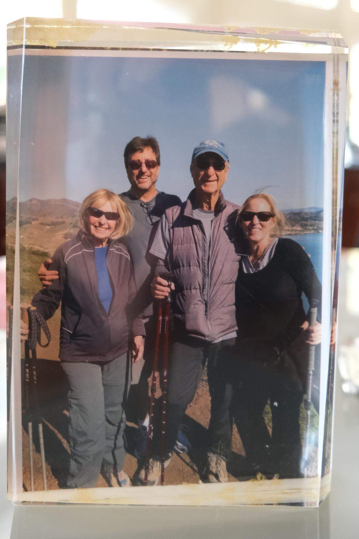 From left to right, Carol, Paul and Saul Goldberg and Robin Einkelstein on a hike near Port San Luis in Avila Beach. This photo was on display in Carol Goldberg’s kitchen on Jan. 8, 2025. Her husband, Saul, died after being hit while cycling in San Luis Obispo on July 23, 2024.