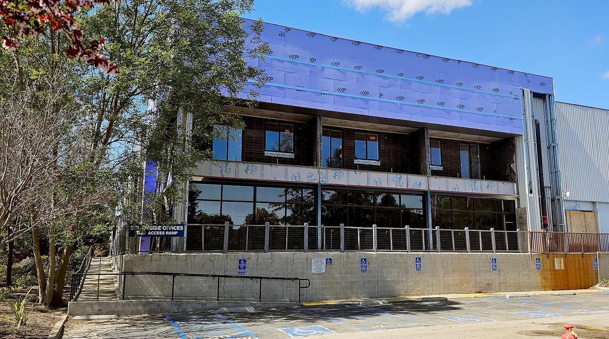 Exposed wrapping material can be seen on the building at 1150 Laurel Lane in San Luis Obispo in March 2025. The tenants, including Bang the Drum brewery and SLO City Church, have been told they have to vacate the property due to unsafe construction conditions.