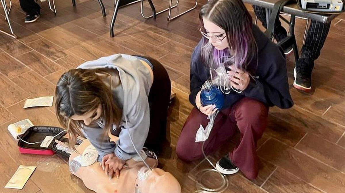 Students at Leffingwell High School in Cambria practice CPR on a dummy during a training session hosted by Cambria Community Healthcare Services District.