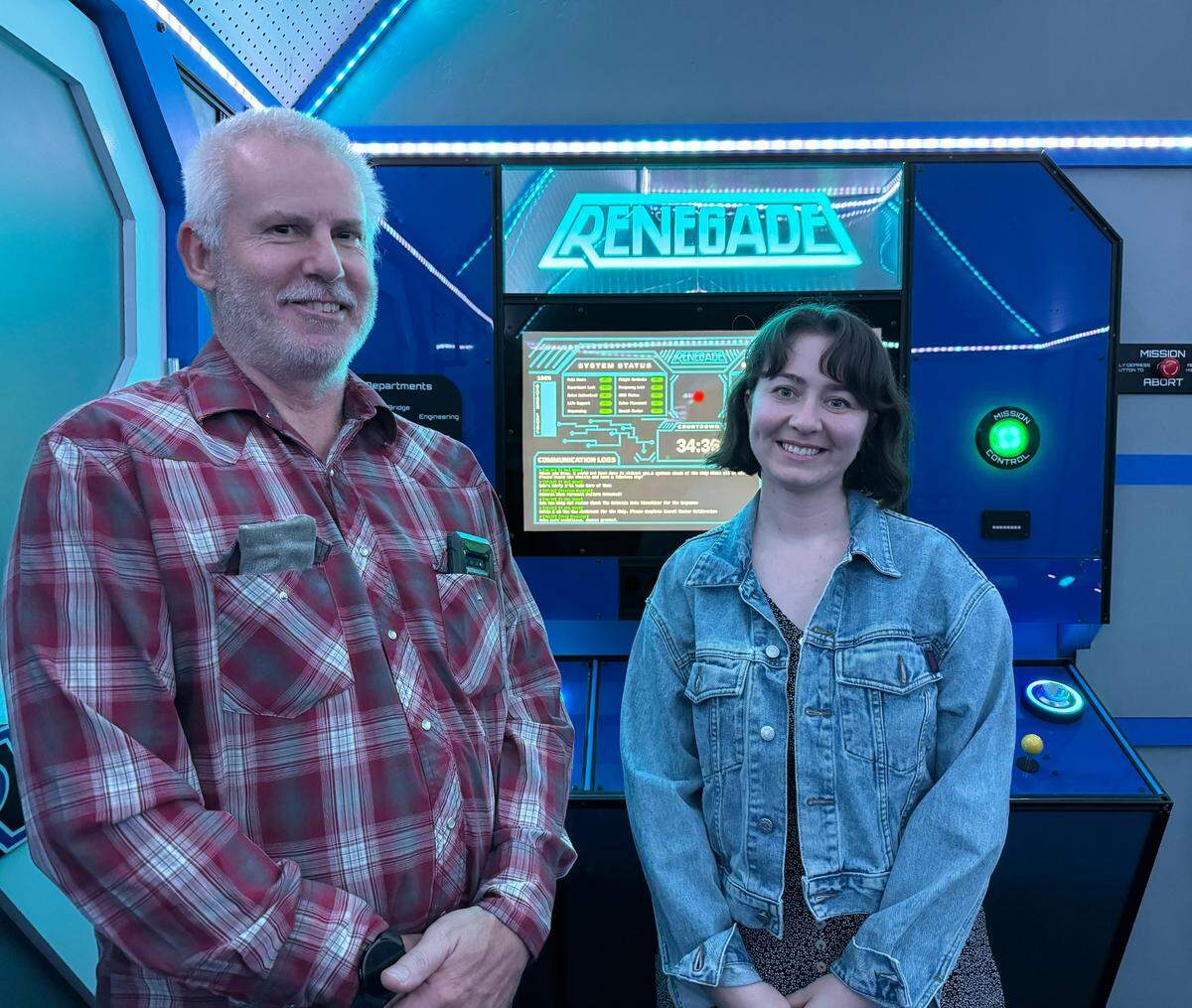 Frank Rodgers, escape room creator, and Ariel Jansen, escape room operator, pose for a photo in ESCAPE! at Margarita Adventures’ new experience “Renegade: The Retrofit” on Oct. 8, 2024.