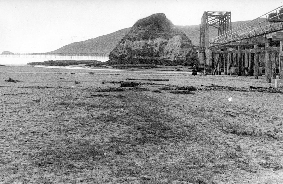 The lowest tide of the year at the mouth of San Luis Obispo creek exposes a broad beach in this photo, published Dec. 21, 1972. The king tide photo also shows the now gone Avila Truss Bridge No. 5 of the Pacific Coast Railroad. Only a concrete henge remains after the bridge collapsed in October 1981.