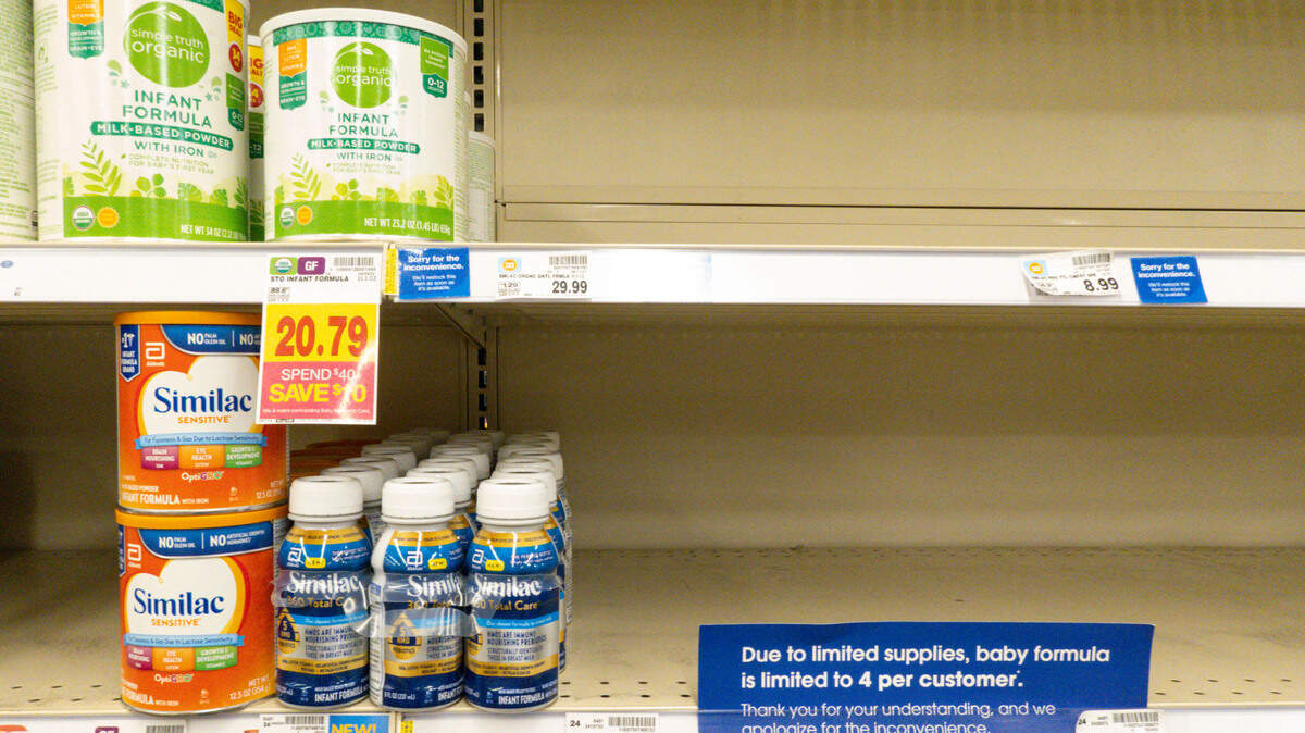 Baby formula is displayed on the shelves of a grocery store with a sign limiting purchases in Indianapolis on Tuesday, May 10, 2022. Parents across the U.S. are scrambling to find baby formula because supply disruptions and a massive safety recall have swept many leading brands off store shelves.