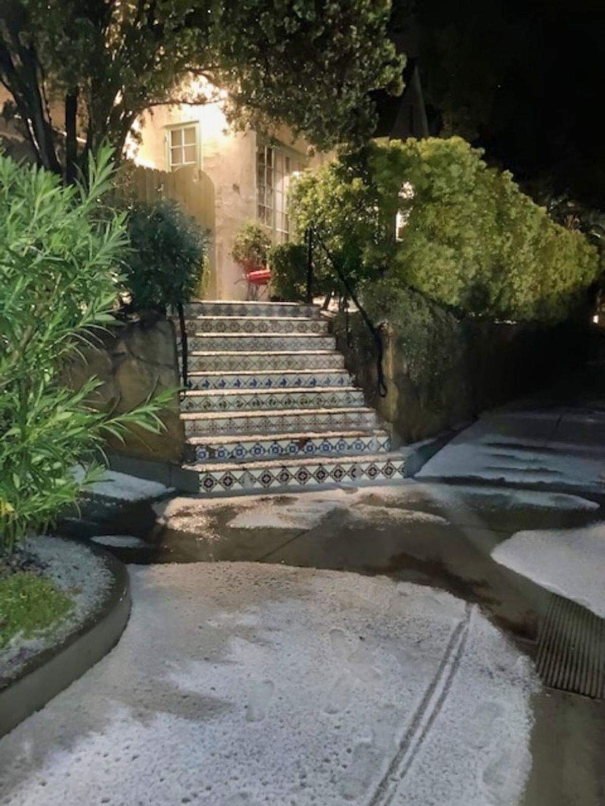 Hail is seen outside a Santa Barbara home Wednesday night.