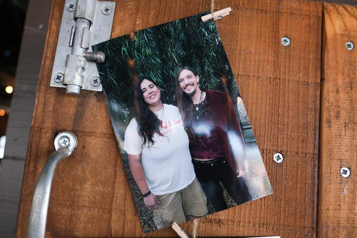A photo of Brandi Anderson, left, and Todd Pinion displayed at Pinion’s memorial in Santa Margarita on Nov. 9, 2024. Pinion was killed in an alleged hate crime on Oct. 23, 2024.