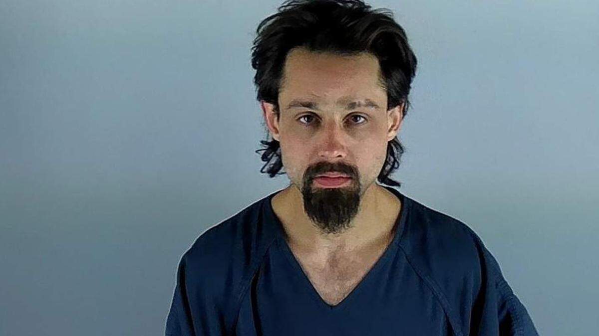 Brian Carl Kennedy, 33, was arrested early Wednesday morning after police say he threatened a road crew, then stole from a laundromat and shattered a glass front door to escape.