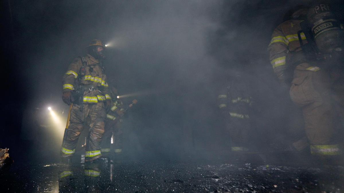 Paso Robles firefighters trained putting out fires during a controlled burn exercise inside a house March 21, 2022 as seen in this frame capture from video.