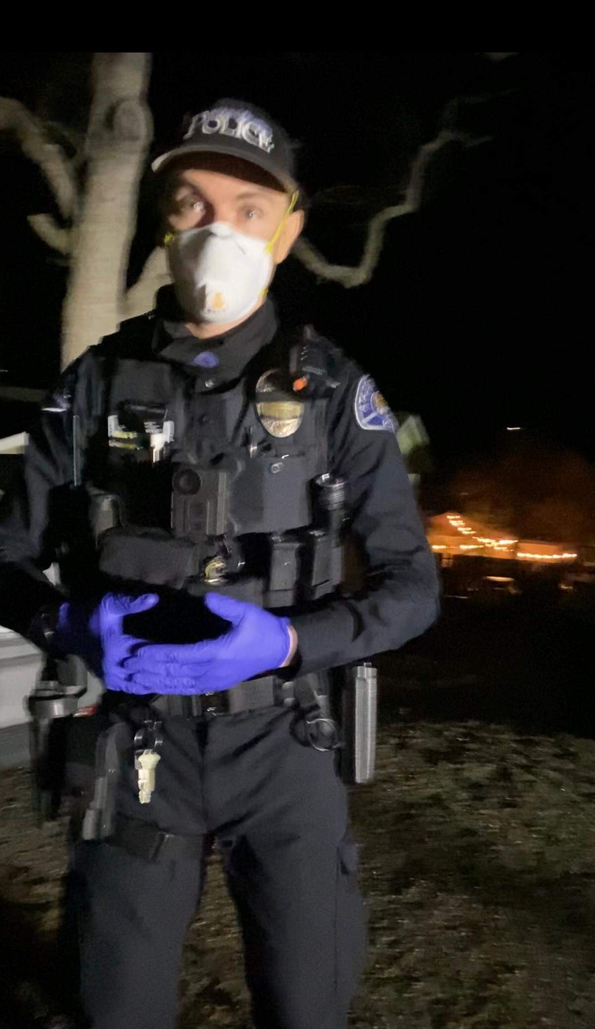 Lisa Kania took a photo of the Atascadero police officer who pulled a gun on her family after responding to a mental health crisis in August 2021. She said it was Officer Zachary Yeaman-Sanchez, but Atascadero Police Chief Robert Masterson said in an email to Kania he could not confirm or deny the identity of the officer.