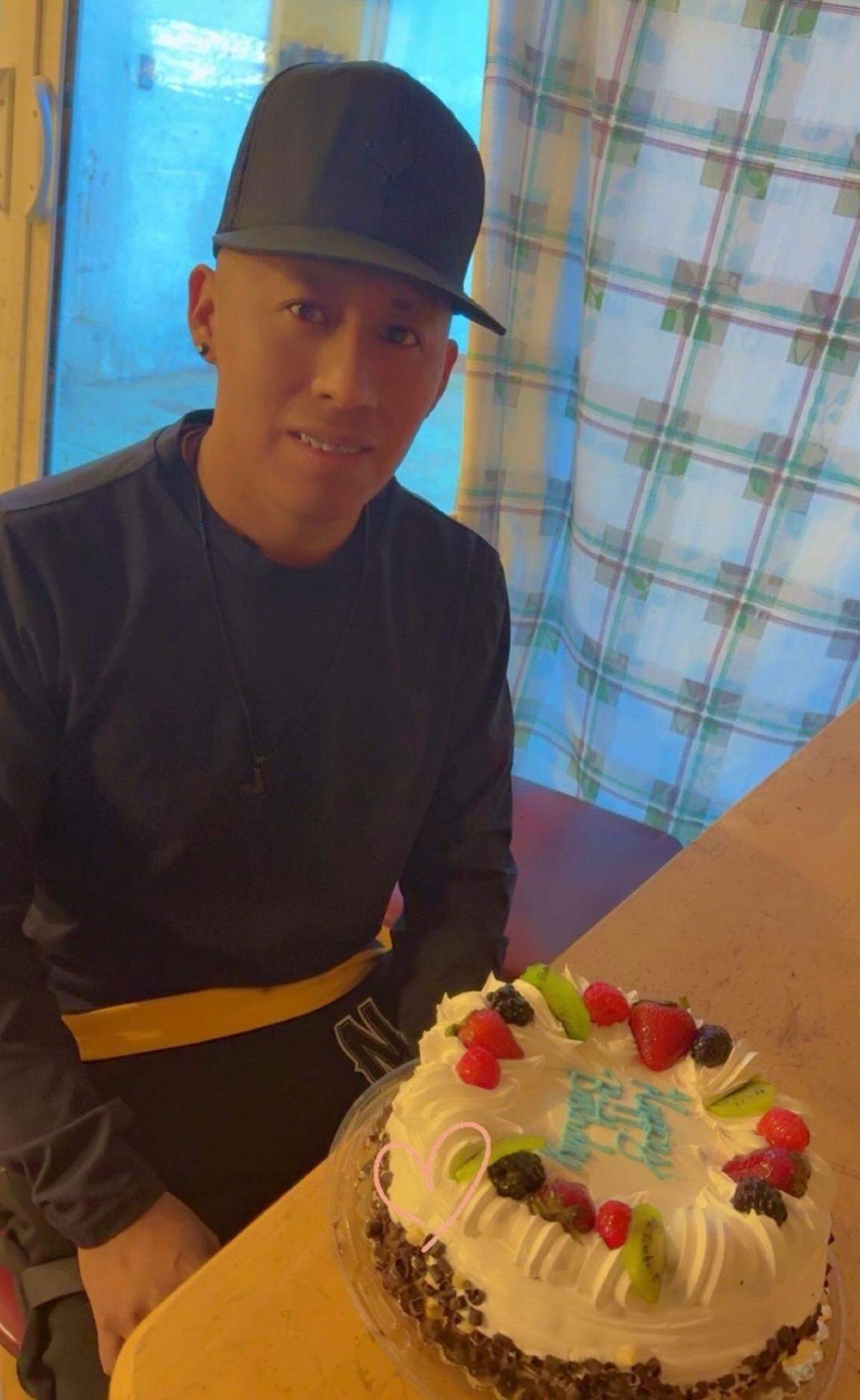 Ismael Garcia Cruz smiles with a cake on his 30th birthday. Garcia Cruz was taken by Immigration and Customs Enforcement on July 2, 2025, after he attending a court hearing.